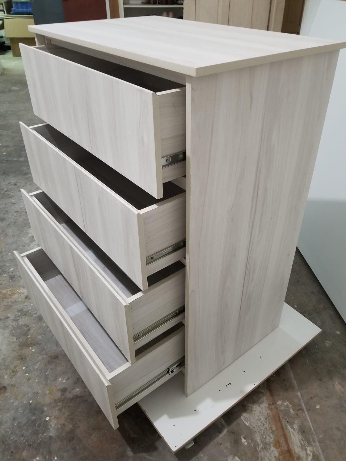 Light oak dresser, side view with drawers open