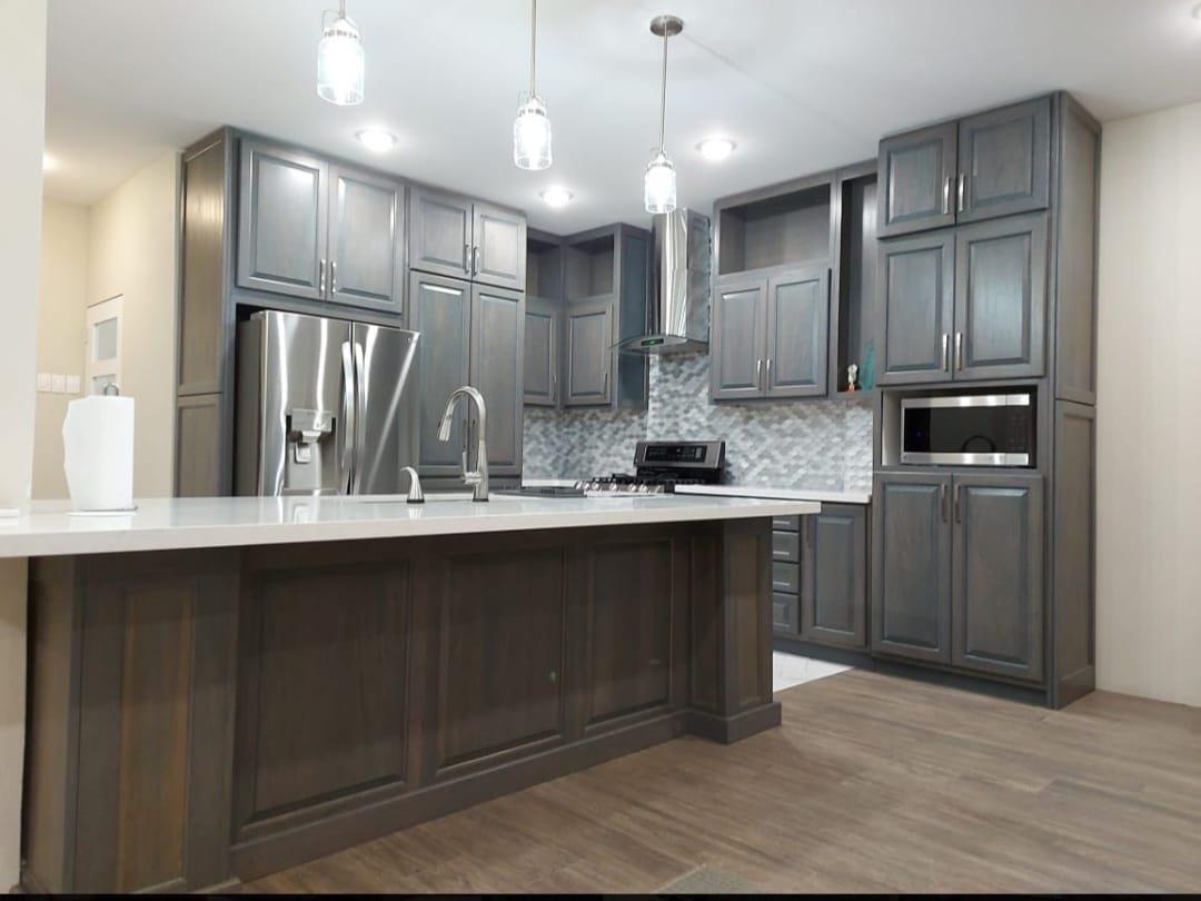Full kitchen remodel, new island wrap, cabinetry, shelving etc.