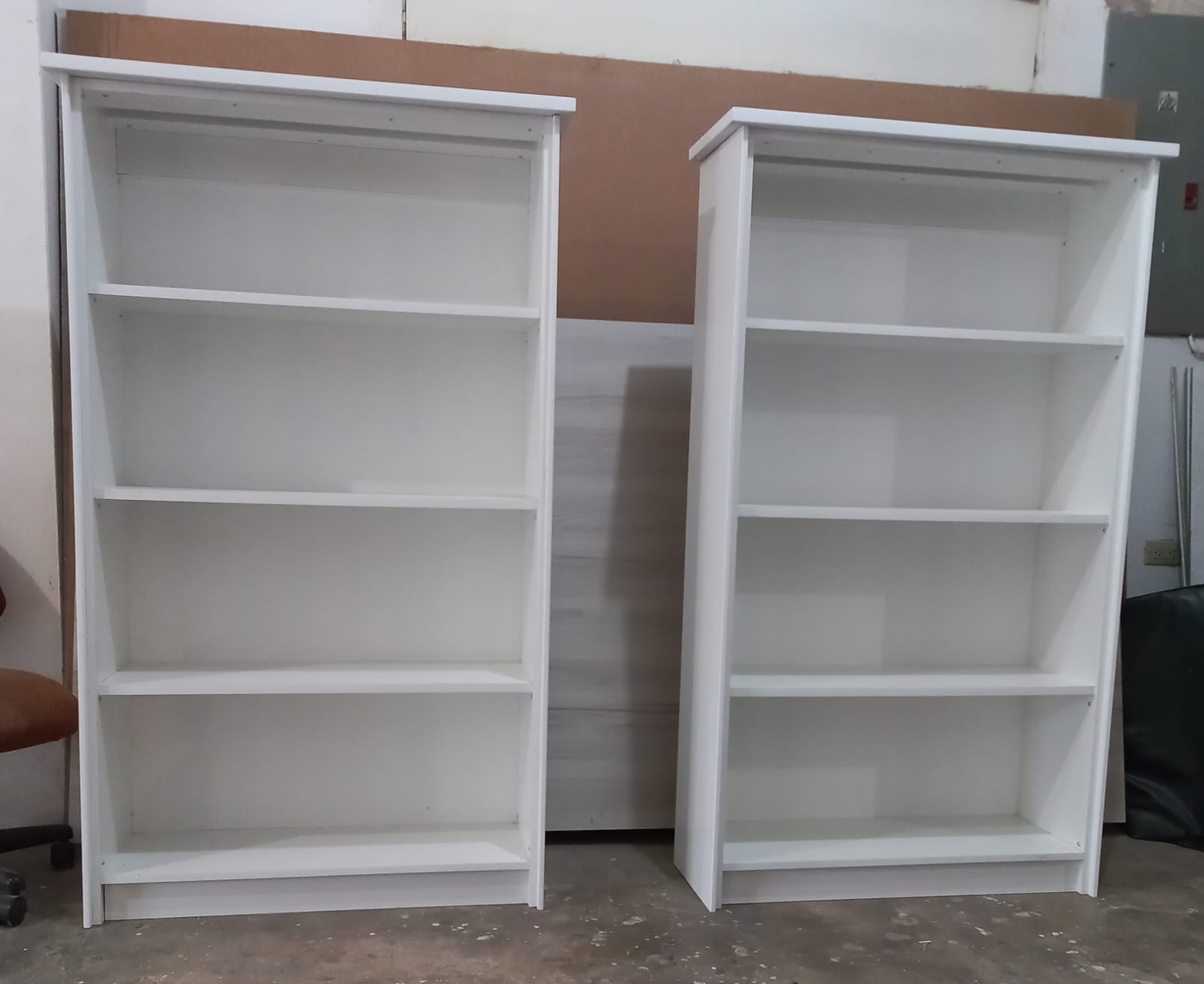 Pair of white four-shelf bookcases