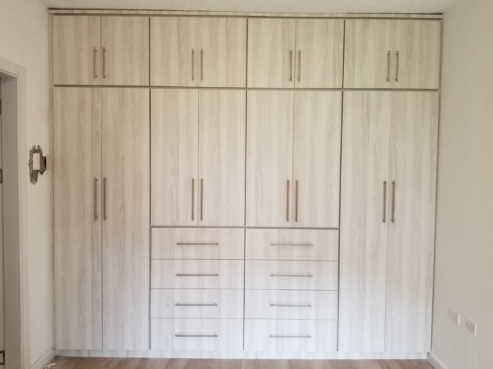 Built-in wardrobe wall, open